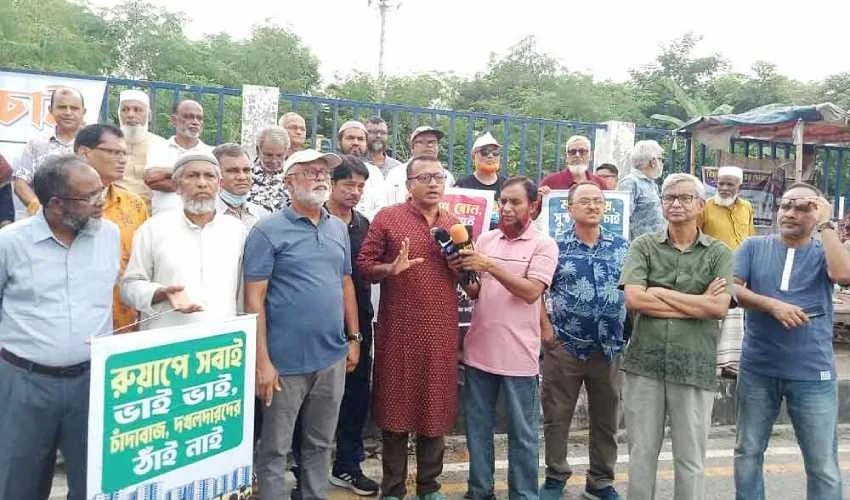 দখল ও মাদকের প্রতিবাদে বাসিন্দাদের মানববন্ধন